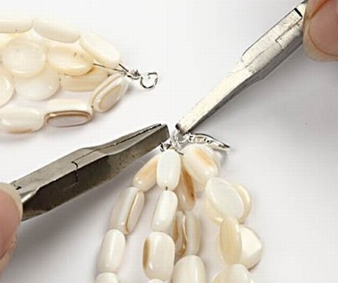 A Chain and Bracelet with Pearl Shells