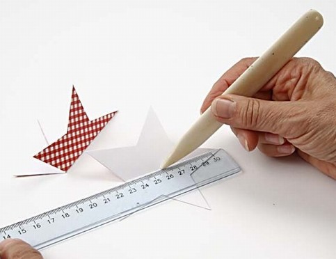 A Punched-Out Shape covered with Vivi Gade Design Paper