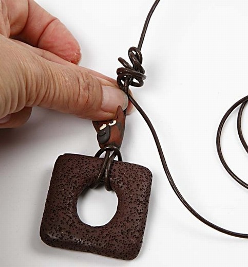 A Design Cord Necklace with a lava ring