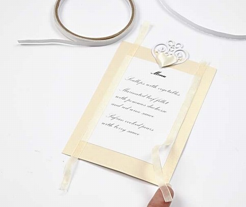 A Wedding Invitation and Table Decoration