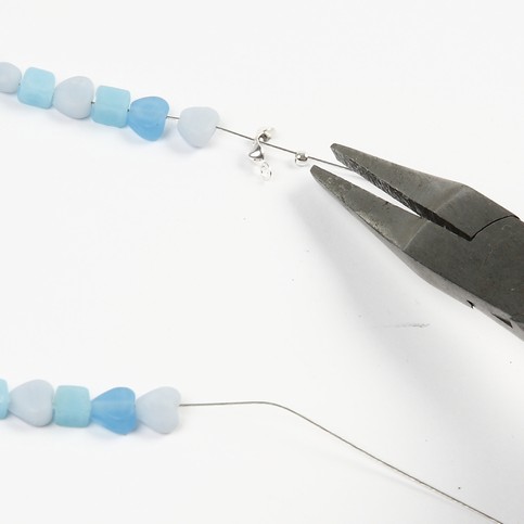 A Necklace with Blue Glass Beads