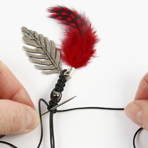 A Necklace with Feathers and Beads