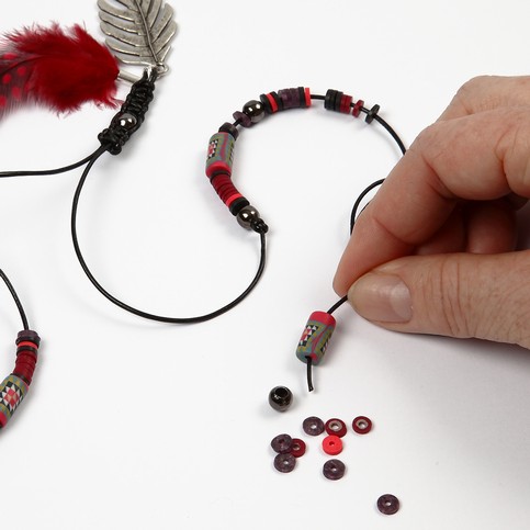 A Necklace with Feathers and Beads