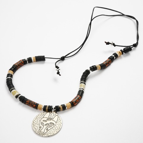 A Necklace with a Metal Pendant