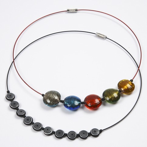 Beads on a Strong Wire