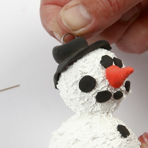 A Snowman using polystyrene balls and modelling paste