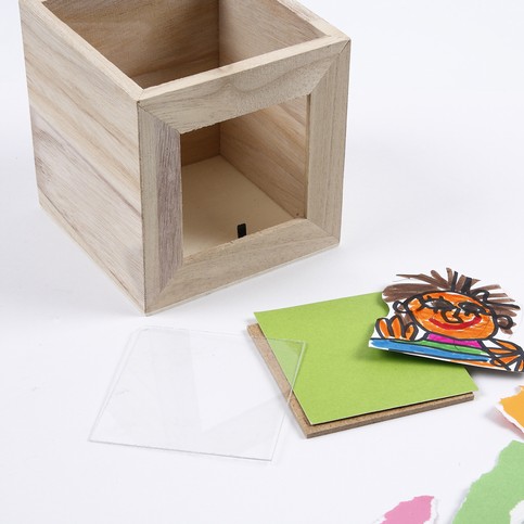 A Small Wooden Storage Box, decorated with Collage