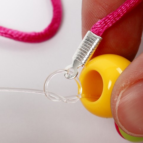 A Necklace with a Shrink Plastic Pendant and Hearts