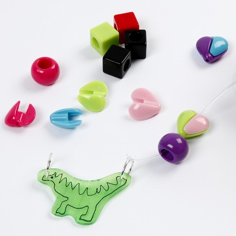 A Necklace with a Shrink Plastic Pendant and Hearts