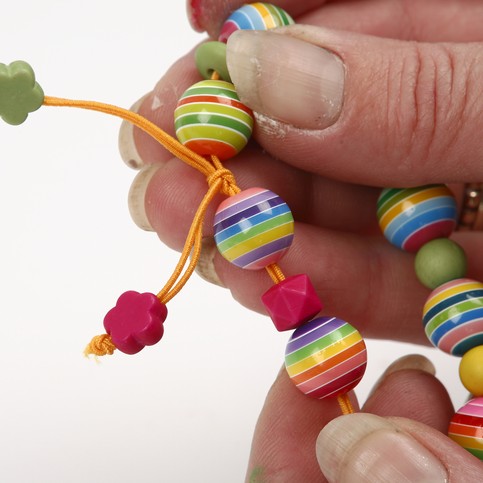 A Brightly Coloured Bracelet with Plastic Beads