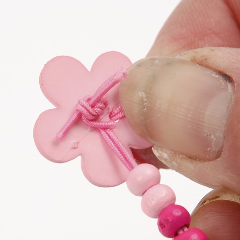 Bracelets with Wooden Beads and a Novelty Flower Button