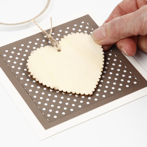 A Party Invitation and Card with a Wooden Heart