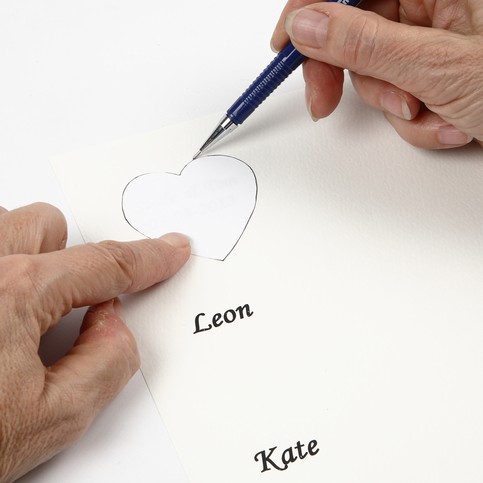 A Party Invitation and Card with a Wooden Heart