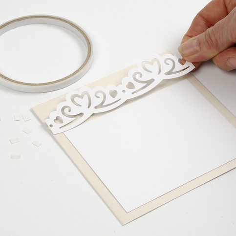 A Party Invitation and Card with Punched-Out Decorations