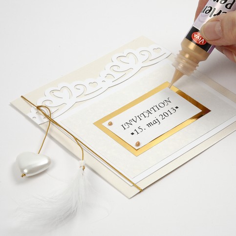 A Party Invitation and Card with Punched-Out Decorations