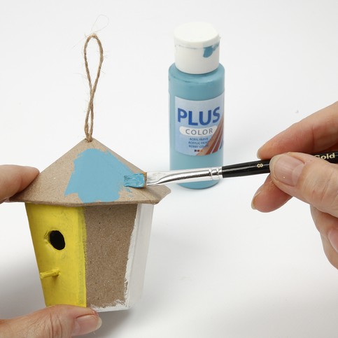 A small Papier-M ch  House, covered with Handmade Paper