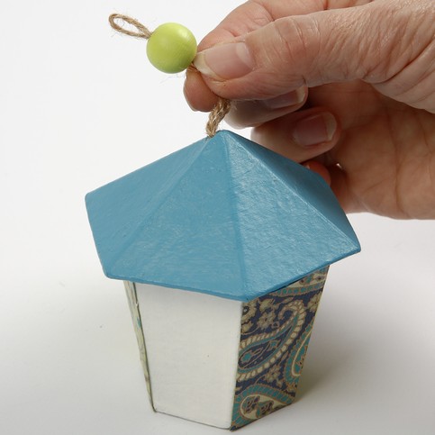 A small Papier-M ch  House, covered with Handmade Paper