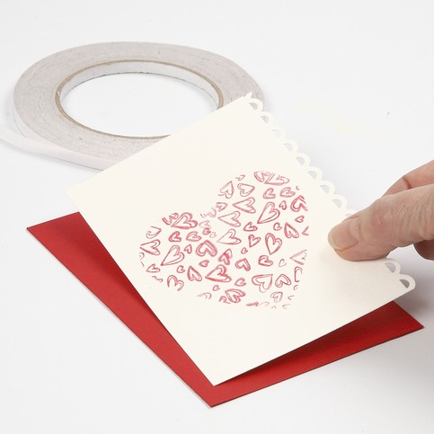 A Tablecloth and a Greeting Card with printed Hearts