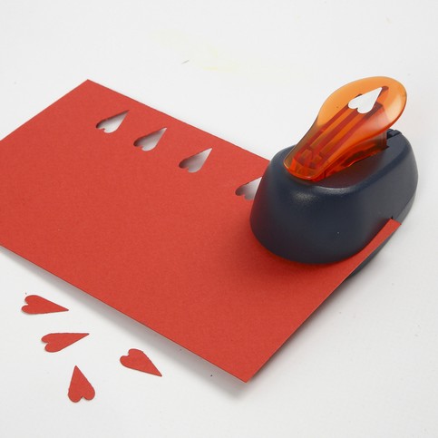 A Tablecloth and a Greeting Card with printed Hearts