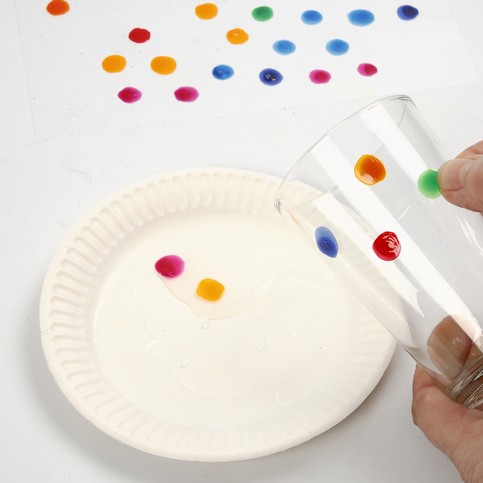 A Candle Holder decorated with colourful Dots