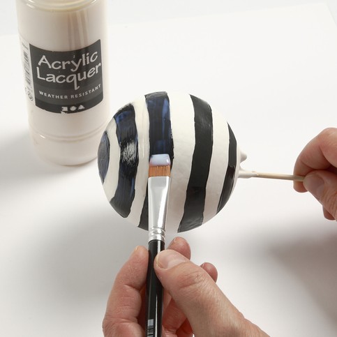 Varnished Plaster Spheres with a Graphic Design