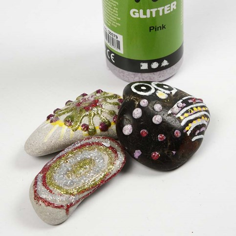 Decorative Stones with colourful Patterns and a luminous Effect