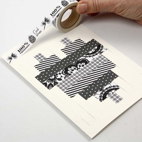 A Folded Greeting Card with a Woven Design made from Vivi Gade Design Paper