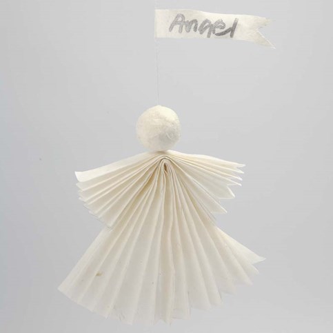 An Angel made from Straw Silk Paper with a Streamer