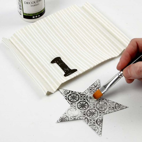 A Table Runner as a Wall Hanging for storing Christmas Cards and Advent Gifts