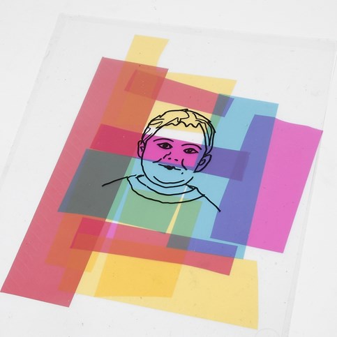 A framed Portrait on a Collage of Coloured Cellophane