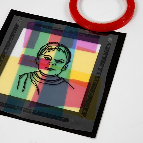 A framed Portrait on a Collage of Coloured Cellophane