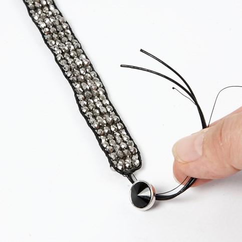 A Braided Bracelet made from Leather Cord and Faceted Beads