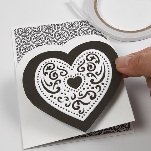 A Card Series with Design Paper, a Filigree Heart and a Piece of Natural Hemp