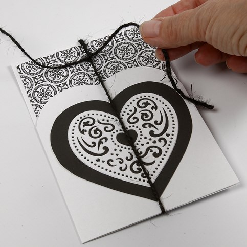 A Card Series with Design Paper, a Filigree Heart and a Piece of Natural Hemp