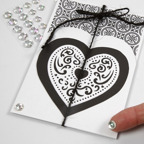 A Card Series with Design Paper, a Filigree Heart and a Piece of Natural Hemp