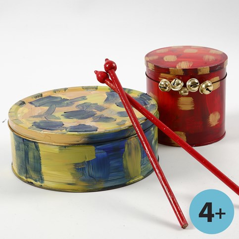 A Drum made from a painted Metal Tin and Drumsticks made from Flower Sticks