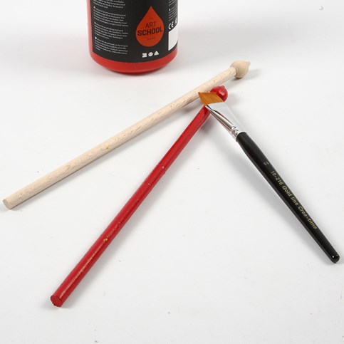 A Drum made from a painted Metal Tin and Drumsticks made from Flower Sticks