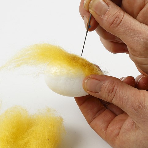 A Needle Felted Chick in a Two-Piece Plastic Egg