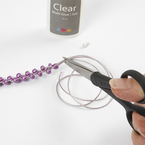 A Plaited Bracelet made from Leather Cords and Rocaille Seed Beads