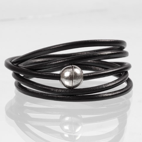 A Bracelet made from a thick Piece of Leather Cord with Links and Spacer Beads