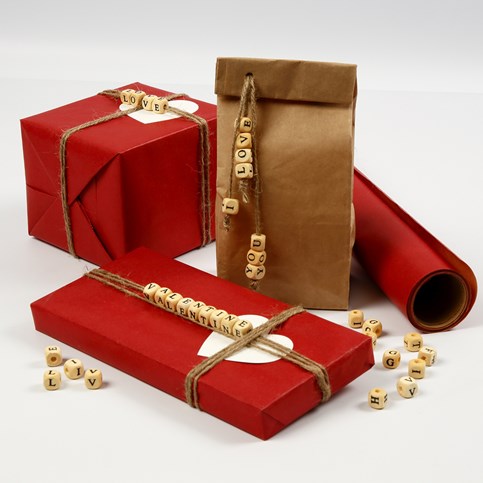 Gift Wrapping with a Message using wooden Beads with Letters on a Piece of Natural Twine