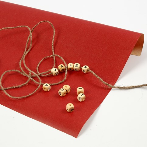 Gift Wrapping with a Message using wooden Beads with Letters on a Piece of Natural Twine