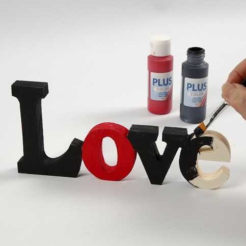 A painted and varnished decorative Word - "Love"