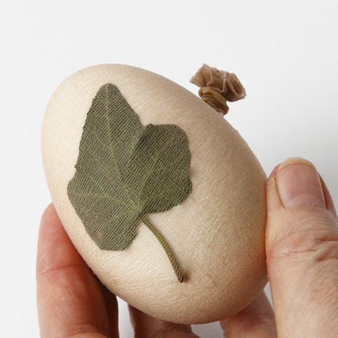 Natural Eggs with Decorative Colouring and a Paper String Waistband