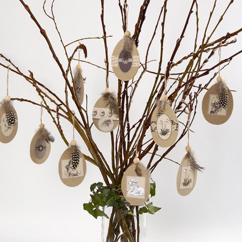 Flat Papier-M ch  Eggs with a Glued-On Motif and Guinea Fowl Feathers