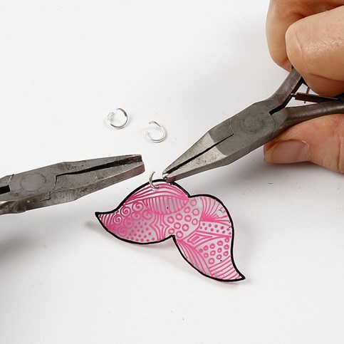 A Moustache Jewellery Pendant made from Shrink Plastic Sheets decorated with Markers