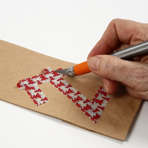 A Calendar made from Paper Bags with Masking Tape Numbers