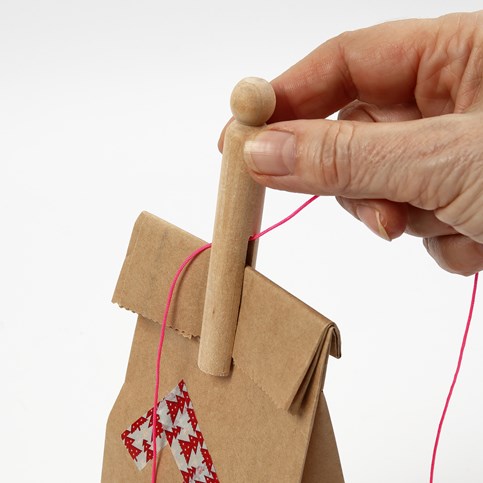 A Calendar made from Paper Bags with Masking Tape Numbers