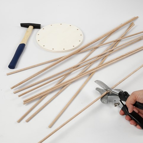 Basket Weaving around a wooden Base and Flower Sticks