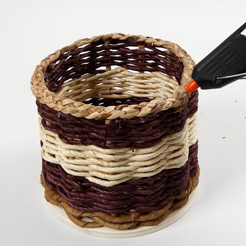 Basket Weaving around a wooden Base and Flower Sticks